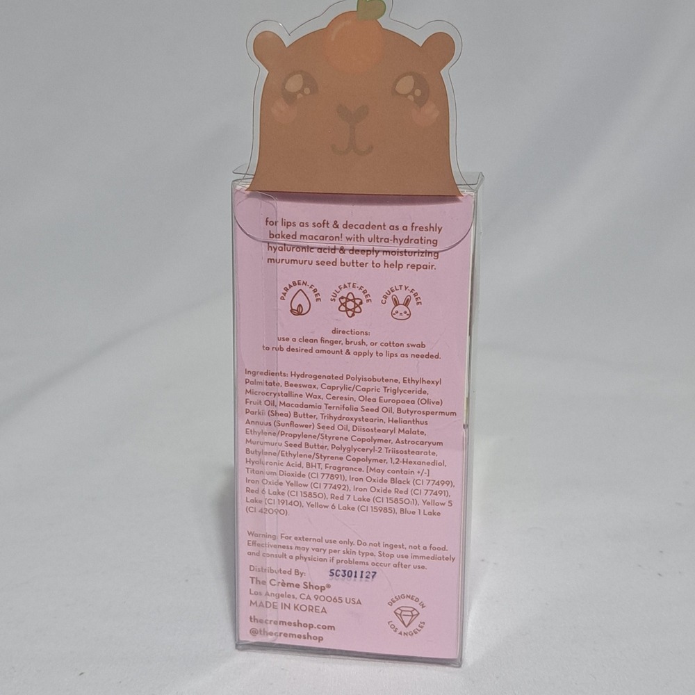 NEW The Creme Shop Moisture‎ Remedy Macaron Lip Balm Capybara 0.26 oz Tangerine - Picture 2 of 4
